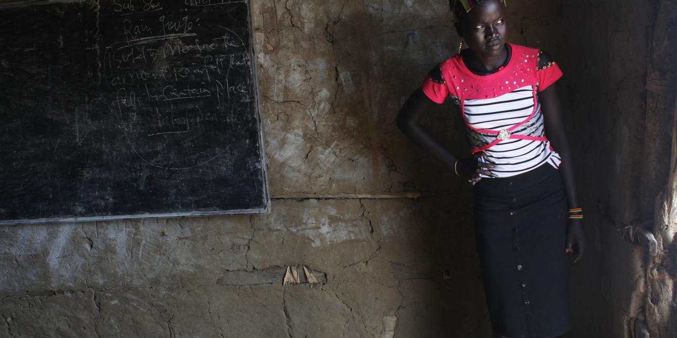 A girl looks out of her classroom in Nyal. Andreea Campeanu/Oxfam