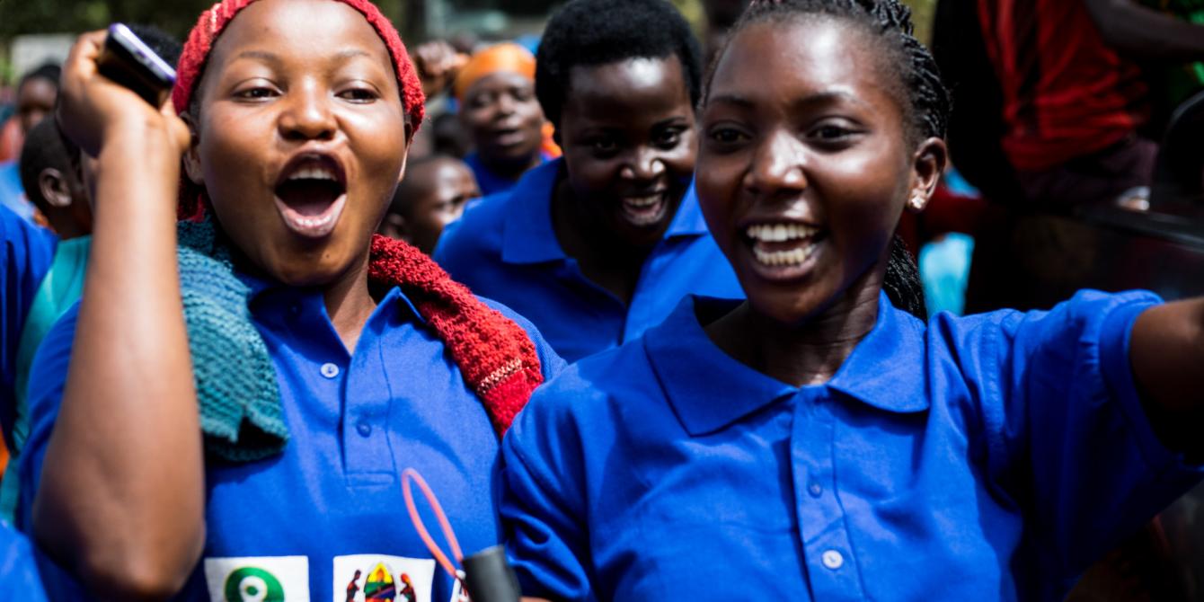 Oxfam volunteers take part in a parade for World Water Day in Tanzania. Amy Christian / Oxfam