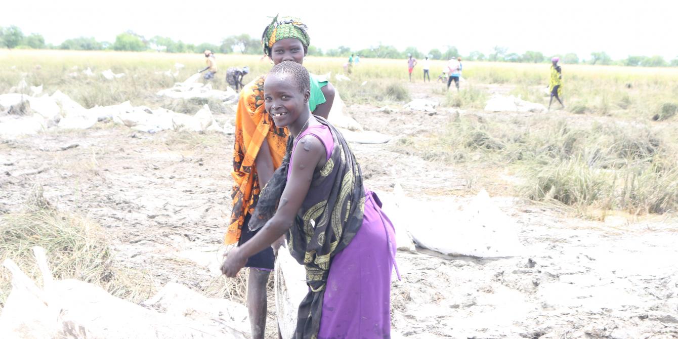 Women collecting food at the food drop zone in Lankien, South Sudan. Photo by Dominic Kango/Oxfam