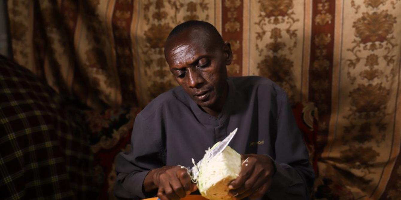 Shadrack helping his wife on household chores. Shadrack helping his wife on household chores.