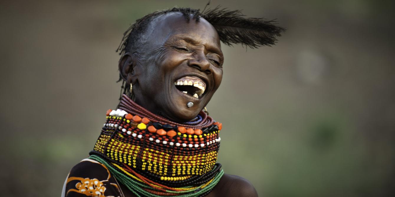 Ipoo Ngachara (55) sings and dances in the village of Nawoyatir in the Lapur district of Lokitaung in Turkana north, Kenya. Photo Credit Kieran Doherty/Oxfam Ipoo Ngachara (55) sings and dances in the village of Nawoyatir in the Lapur district of Lokitaung in Turkana north, Kenya. Photo Credit Kieran Doherty/Oxfam