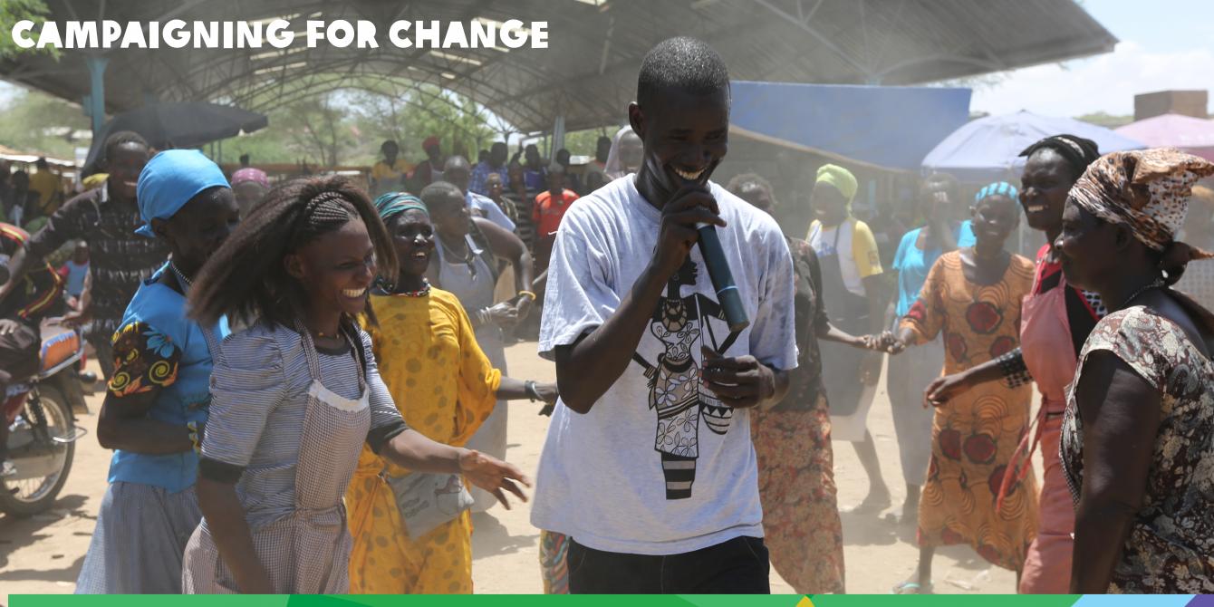 Women participating in a live radio show in Lodwar market with Emmanuel Ekuwon, Jambo Turkana on oil exploration and community rights. Photo Credit: LightBox Limited Women participating in a live radio show in Lodwar market with Emmanuel Ekuwon, Jambo Turkana on oil exploration and community rights. Photo Credit: LightBox Limited
