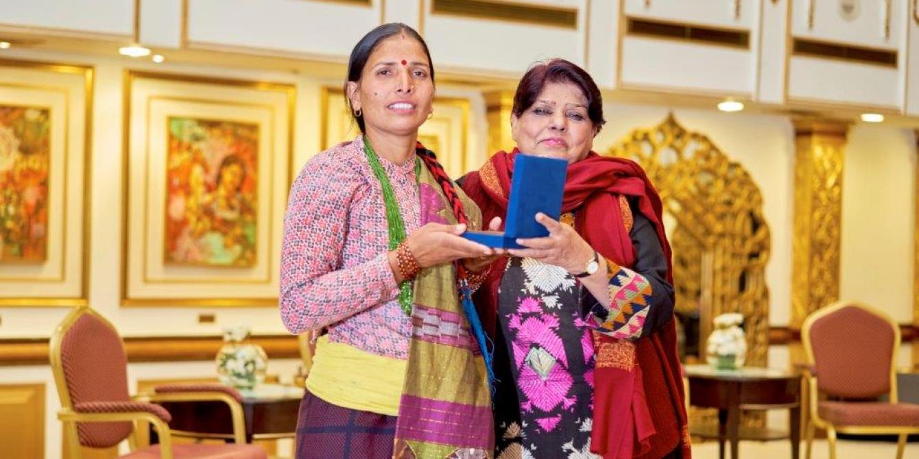 Tika receives the Aawaz community leader award - Kami Images Tika receives the Aawaz community leader award - Kami Images