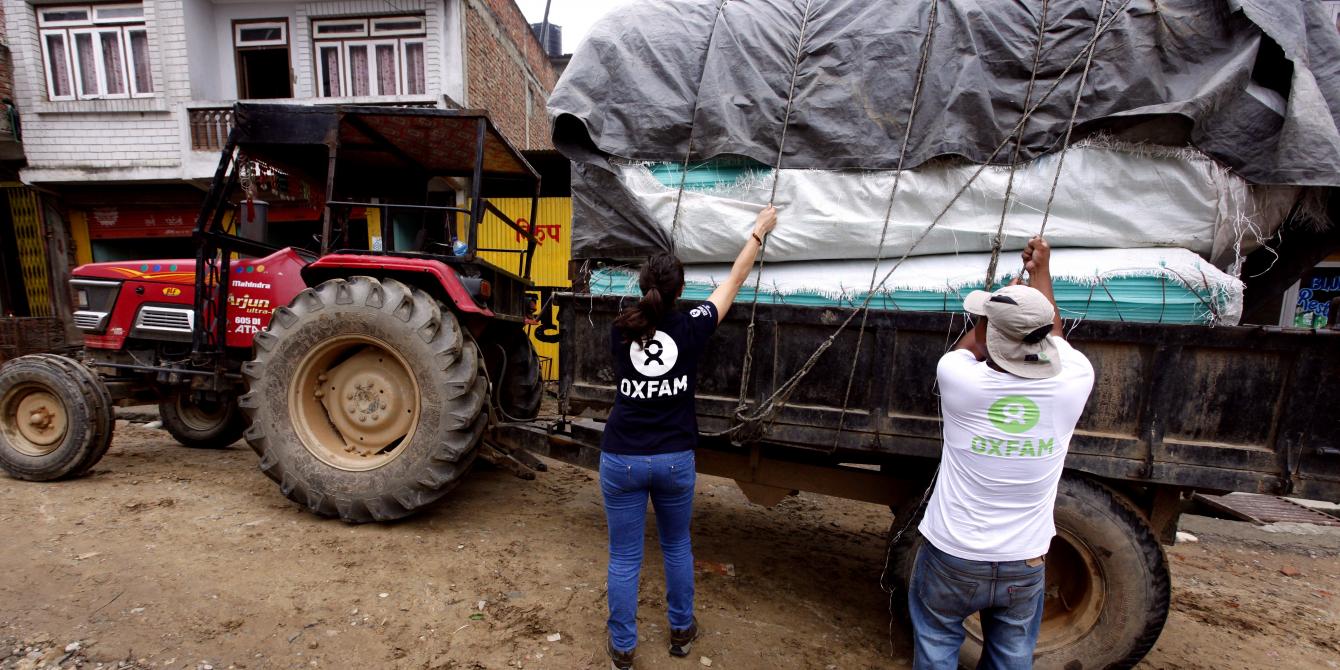 Oxfam staff loading supplies for earthquake-affected families in Nepal Oxfam staff loading supplies for earthquake-affected families in Nepal