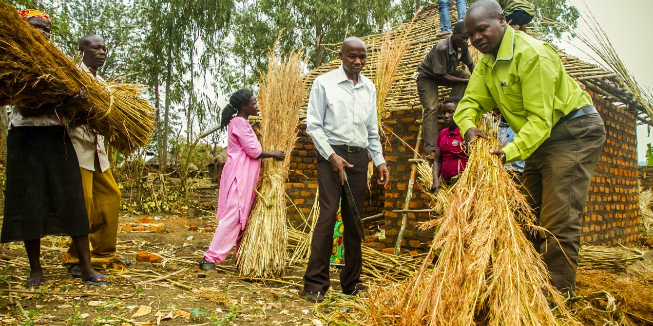 Members of RAFODA neighborhood assembly in Gulu district involved in constructing a house for one of their members. members (men and women) of RAFODA neighbourhood assembly in Gulu district supporting one of their members in constructing his house. Photo credit: Oxfam photos
