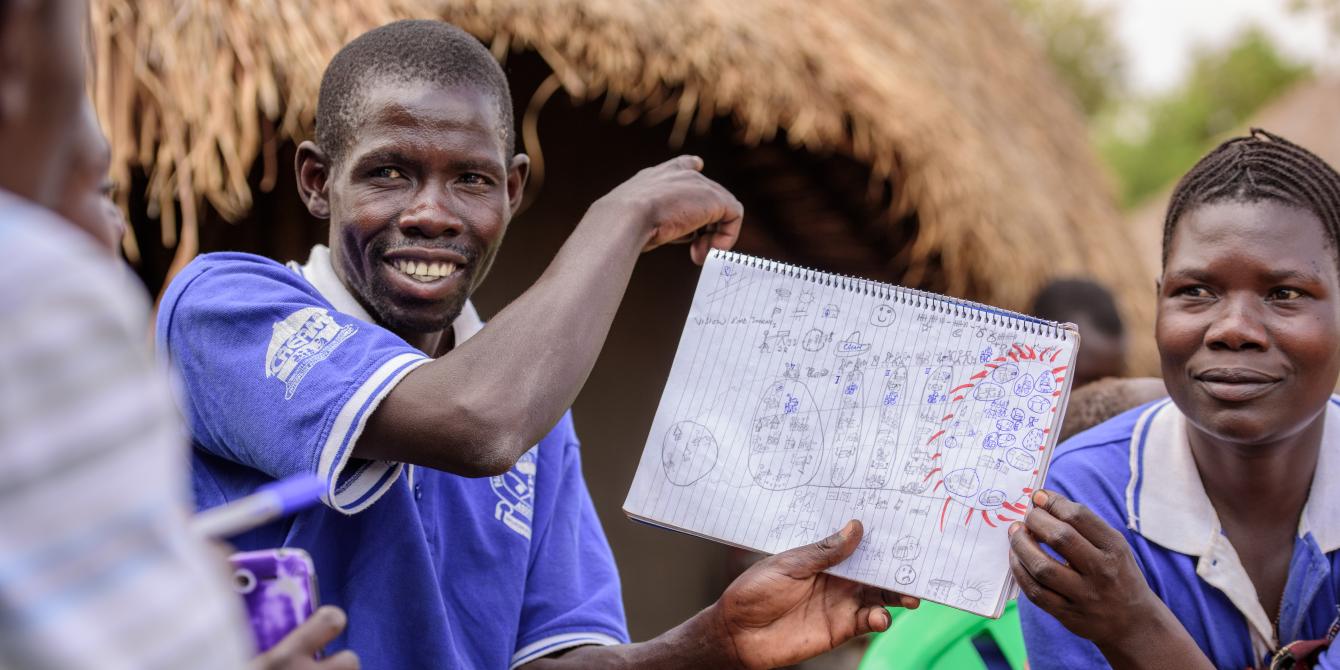 Joseph and Victoria Wadribo show their family vision. With the Oxfam GALS methodology, couples are planning together,developing their visions and in a way becoming accountable to each other. Joseph and Victoria Wadribo show their family vision. Photo credit: Oxfam