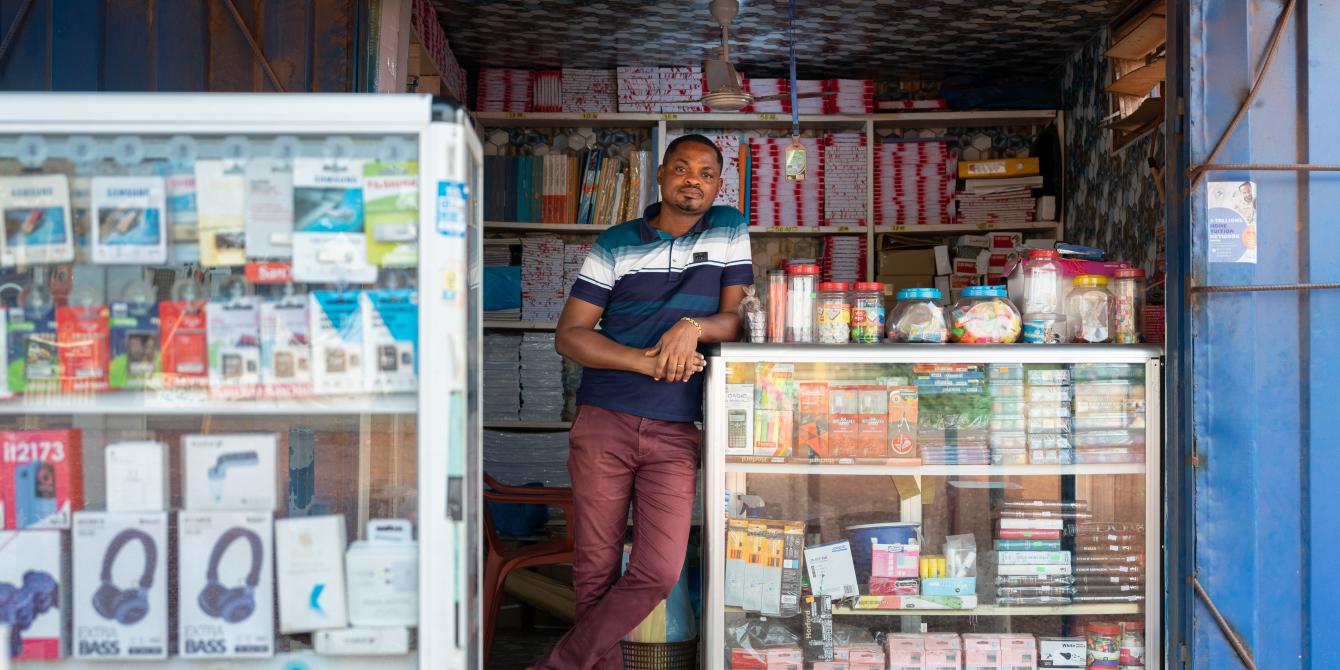Vincent, a public servant in Ghana, started a stationery shop to supplement his income. Photo credit : Ernest Ankomah/ Oxfam