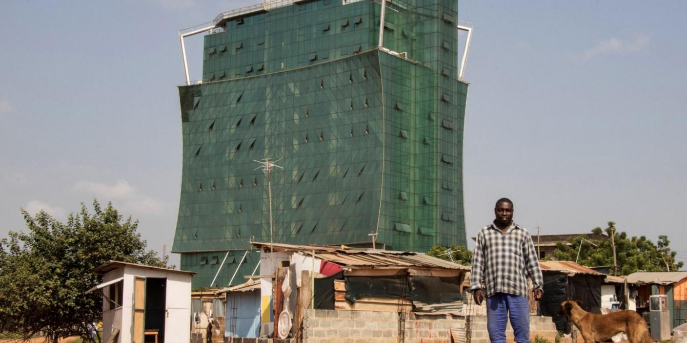 Peter Akmtter is a construction worker on one of the high-rise buildings shooting up in Ghana’s capital, Accra. He and many of the workers live with their families in makeshift houses on or close to the building-sites. Photo: Lotte Ærsøe/Oxfam Peter Akmtter is a construction worker on one of the high-rise buildings shooting up in Ghana’s capital, Accra. He and many of the workers live with their families in makeshift houses on or close to the building-sites. Photo: Lotte Ærsøe/Oxfam